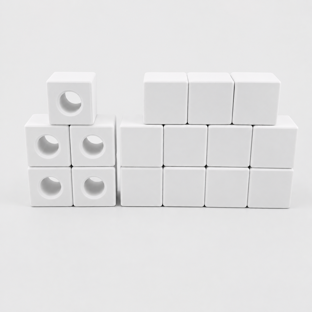 Vista cenital cubos Merrill-Palmer-R 12 con cantos redondeados 5 ensartar PLA evaluación coordinación visomotora infantil | Merrill-Palmer-R 12 rounded edge 5 threading cubes top view PLA visuomotor coordination developmental assessment