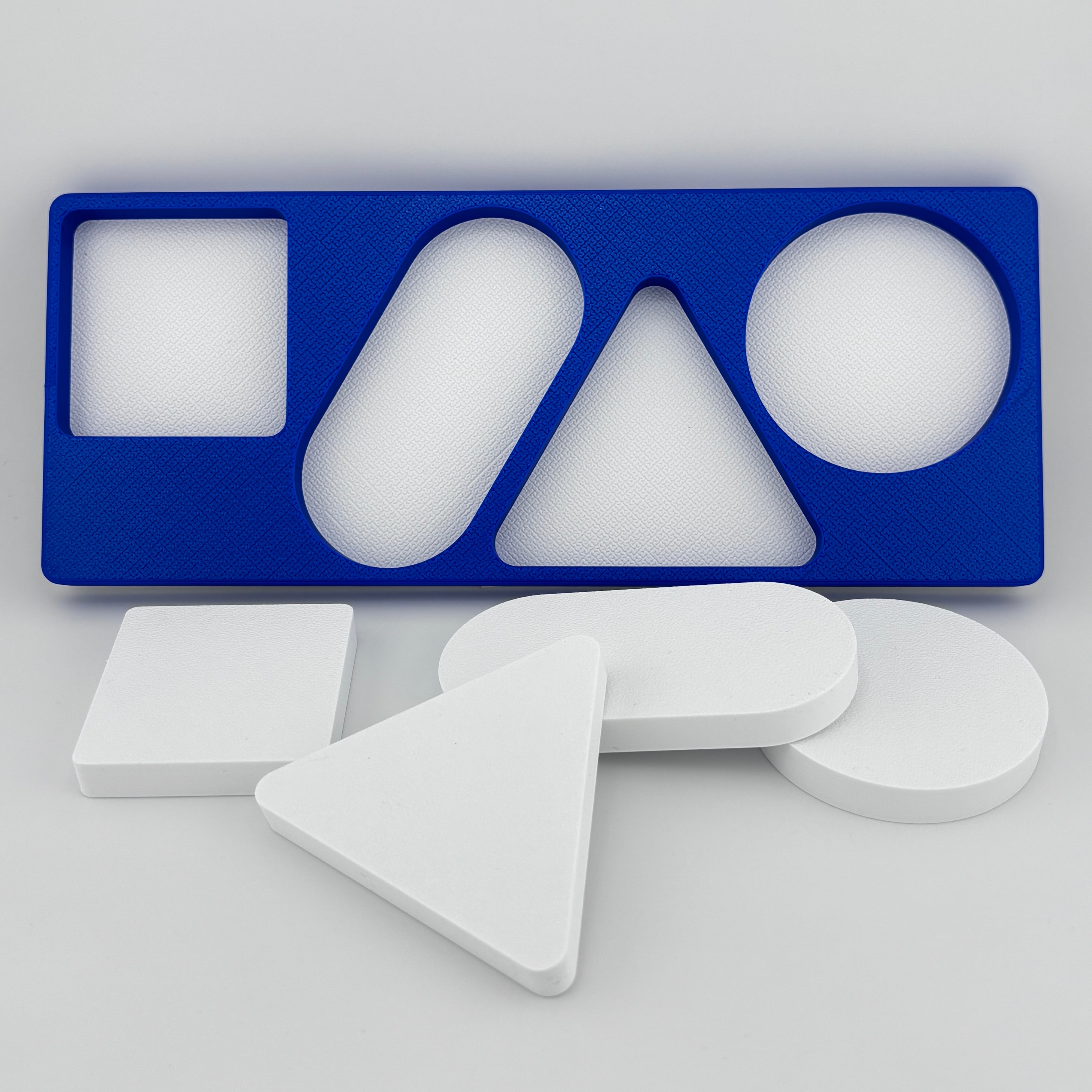 Tablero Merrill-Palmer-R azul con las 4 piezas blancas encajadas evaluación desarrollo cognitivo
infantil | Merrill-Palmer-R blue form board 4 white pieces fitted cognitive developmental assessment children
