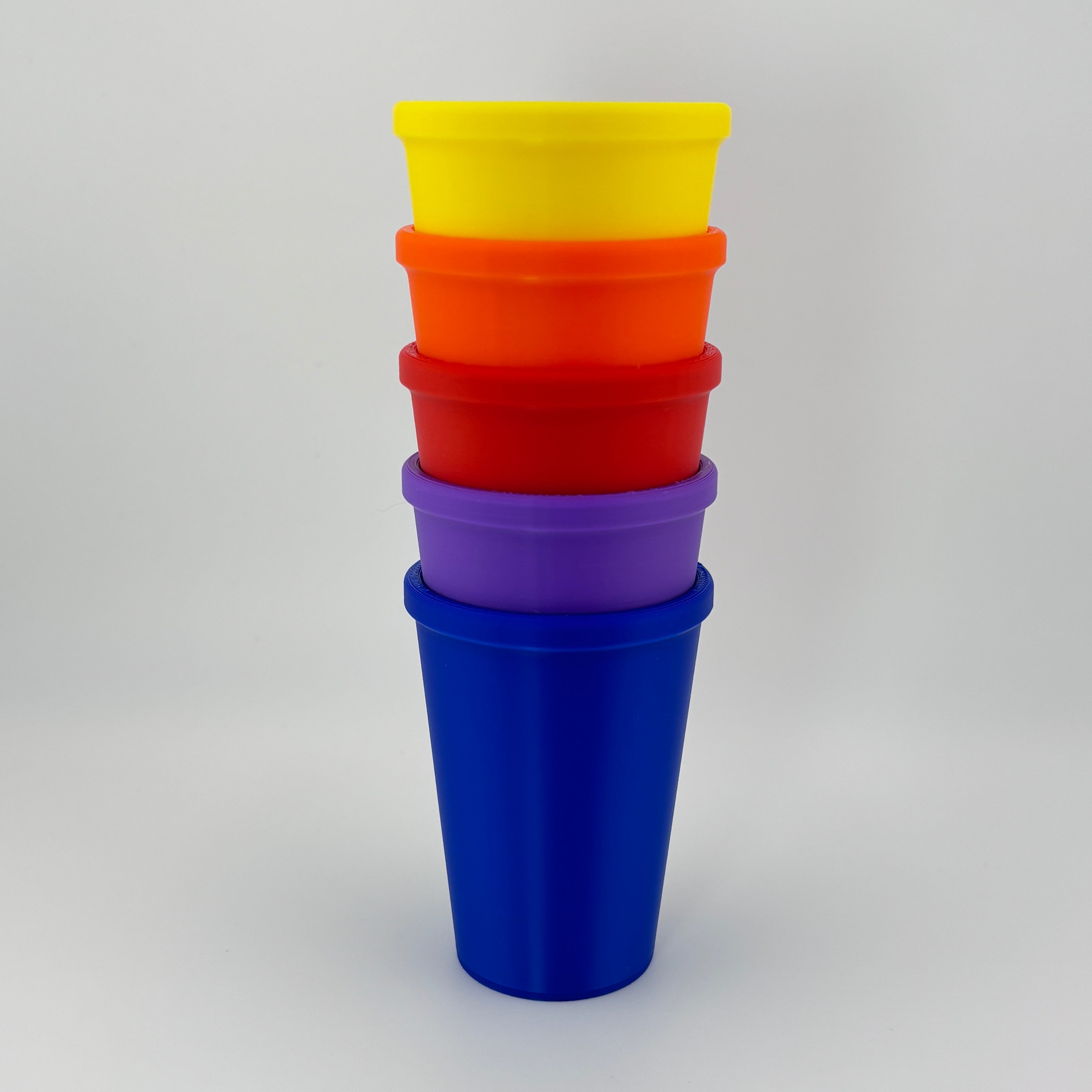 Los 5 cubiletes Merrill-Palmer-R apilados amarillo naranja rojo morado y azul PLA evaluación clasificación | Merrill-Palmer-R 5 cups stacked yellow orange red purple blue PLA color
classification assessment